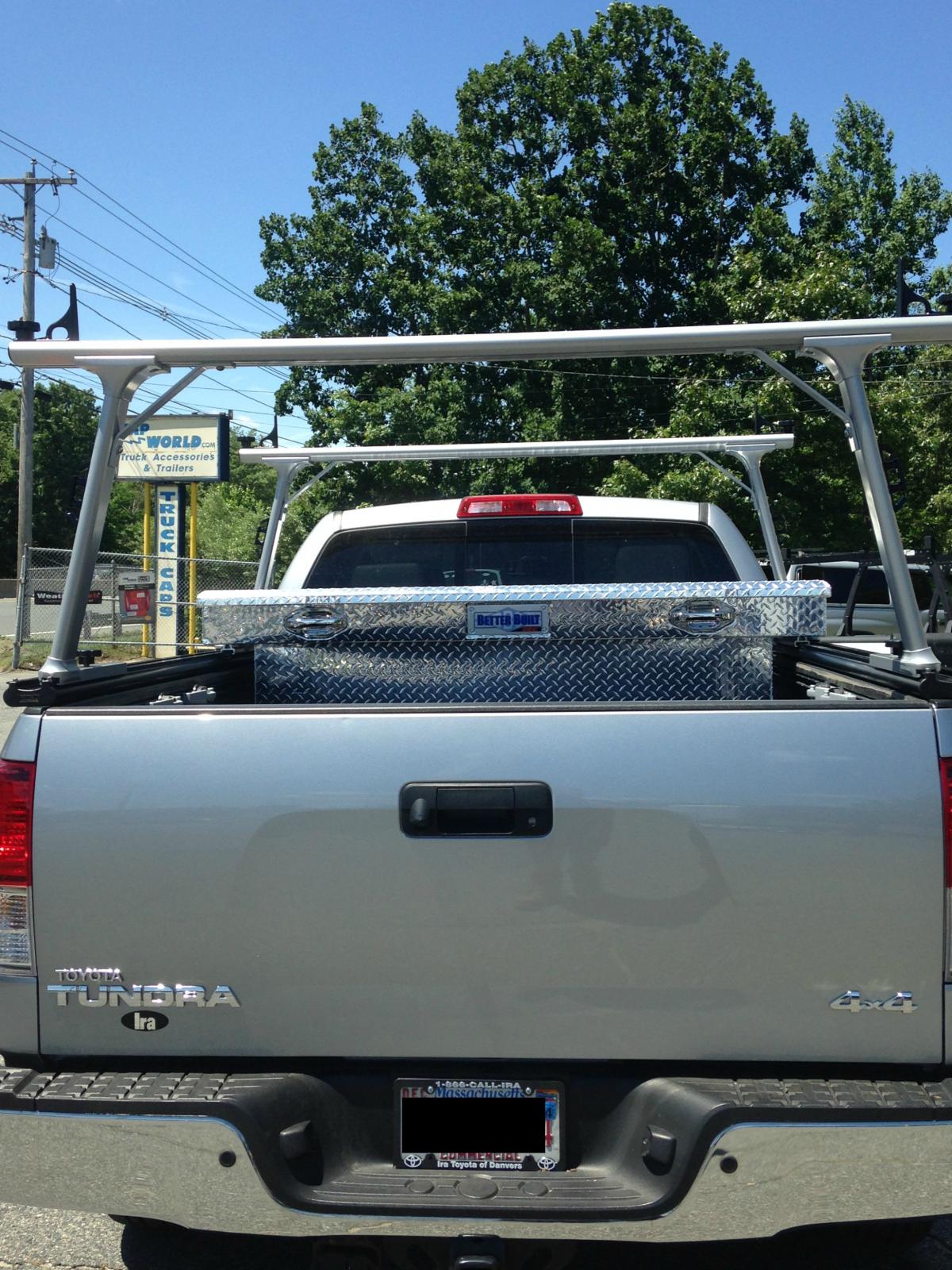 Ladder rack for truck store with tool box